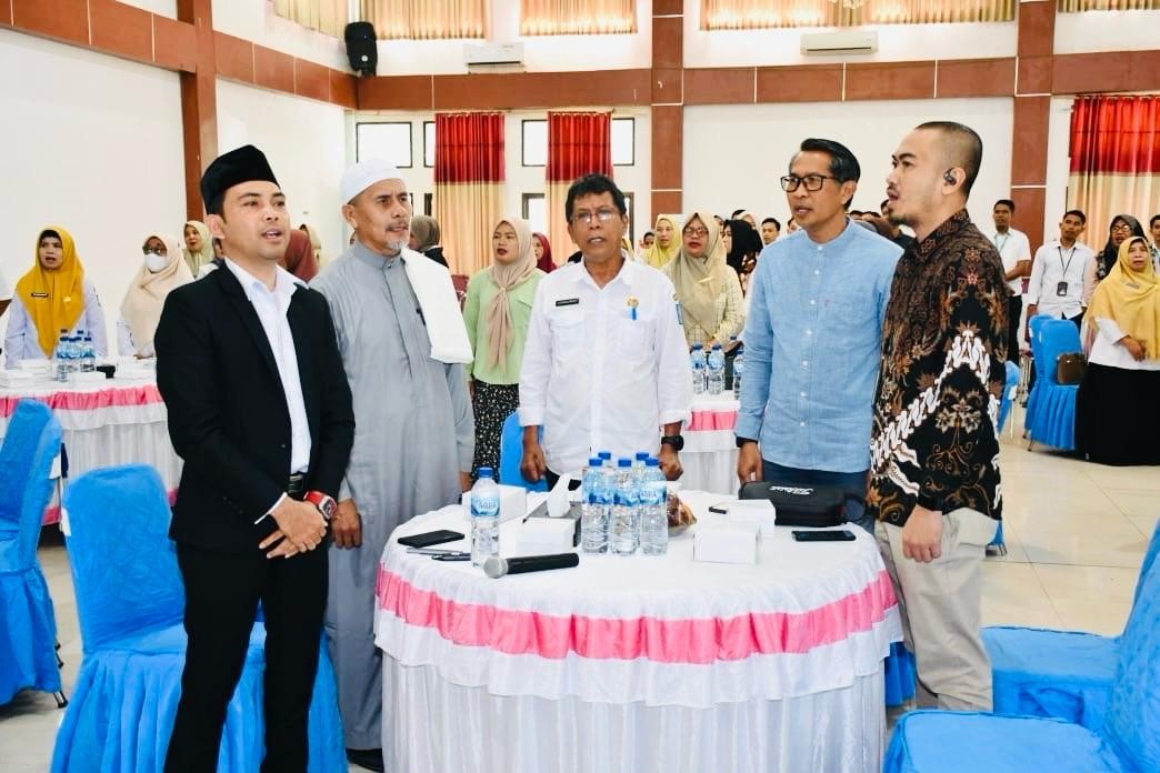 Wakili Bupati,  Plt. Asisten 1 Setda Dompu Buka seminar Arrum Haji dan Umroh Pegadaian Syariah